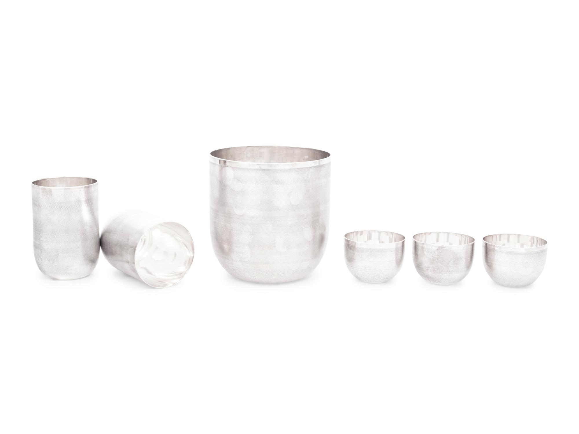 A Puiforcat Jacaranda Silver-Plate Barware Set