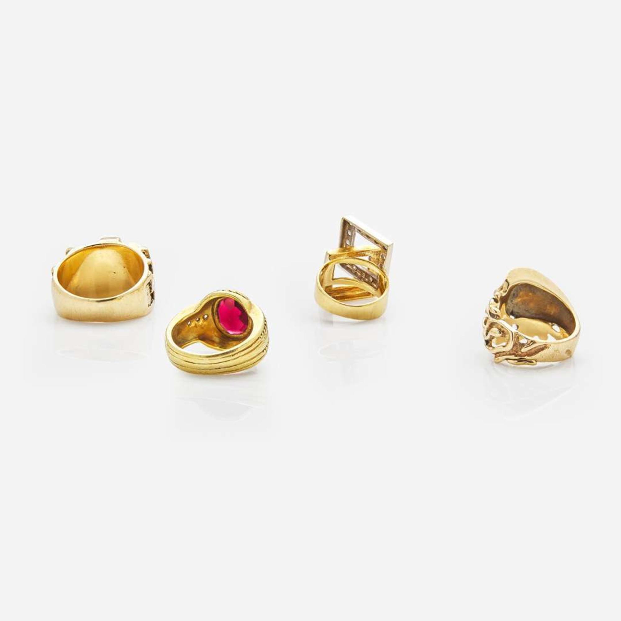 A Collection of Four Contemporary Yellow Gold and Gemstone Rings