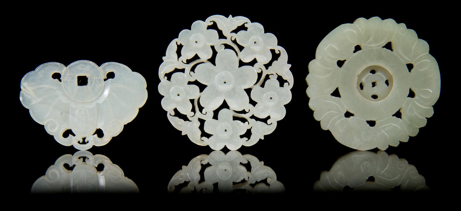 Three Carved Jade Pendants Diameter of first 2 1/4 inches.