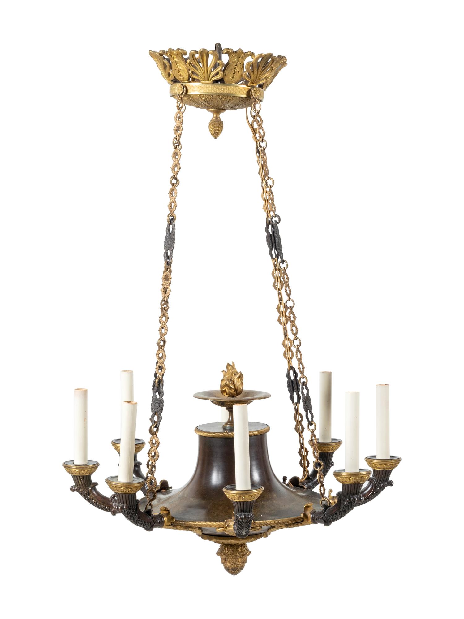 An Empire Style Gilt and Patinated Bronze Eight-Light Chandelier
