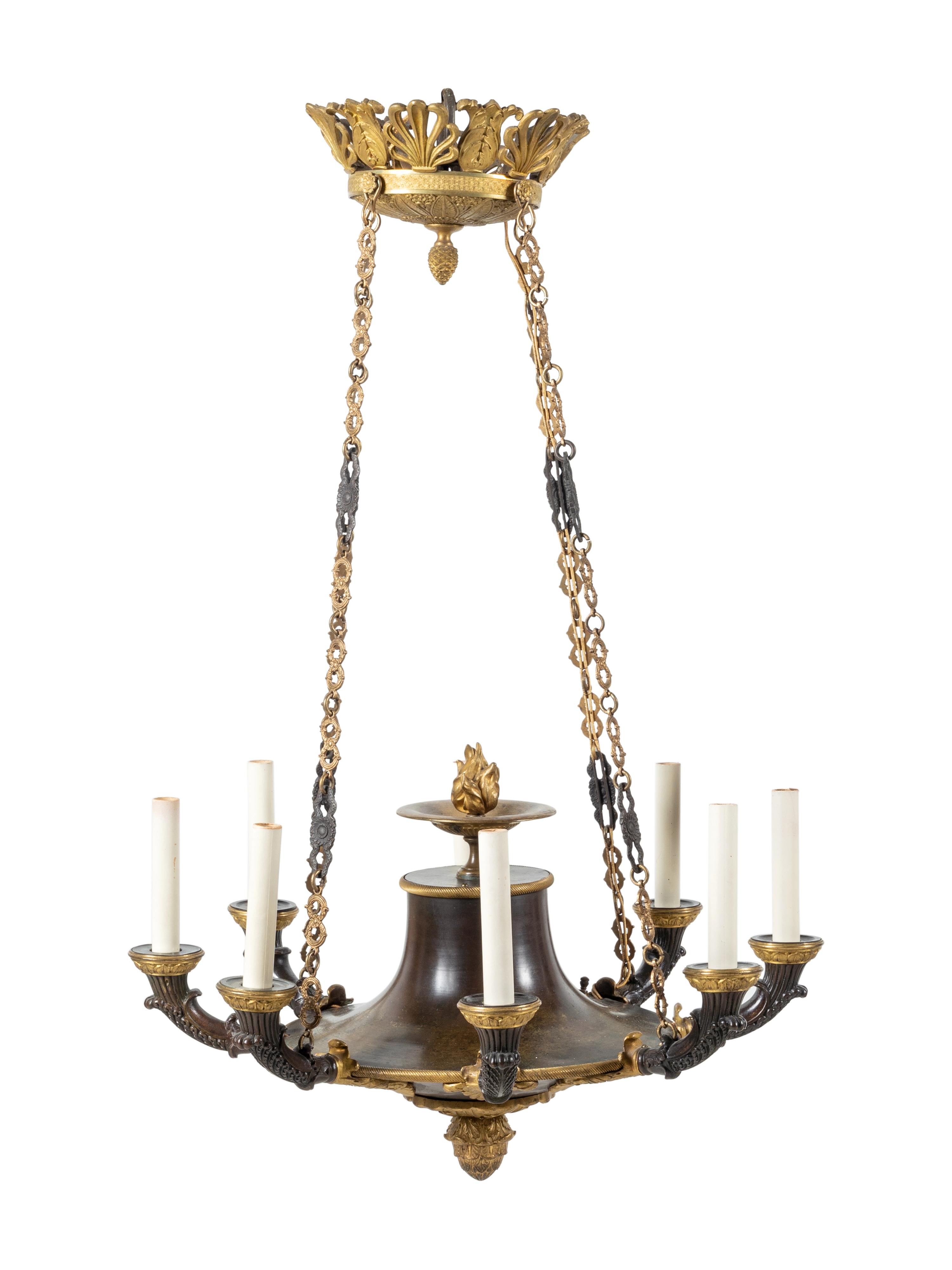 An Empire Style Gilt and Patinated Bronze Eight-Light Chandelier