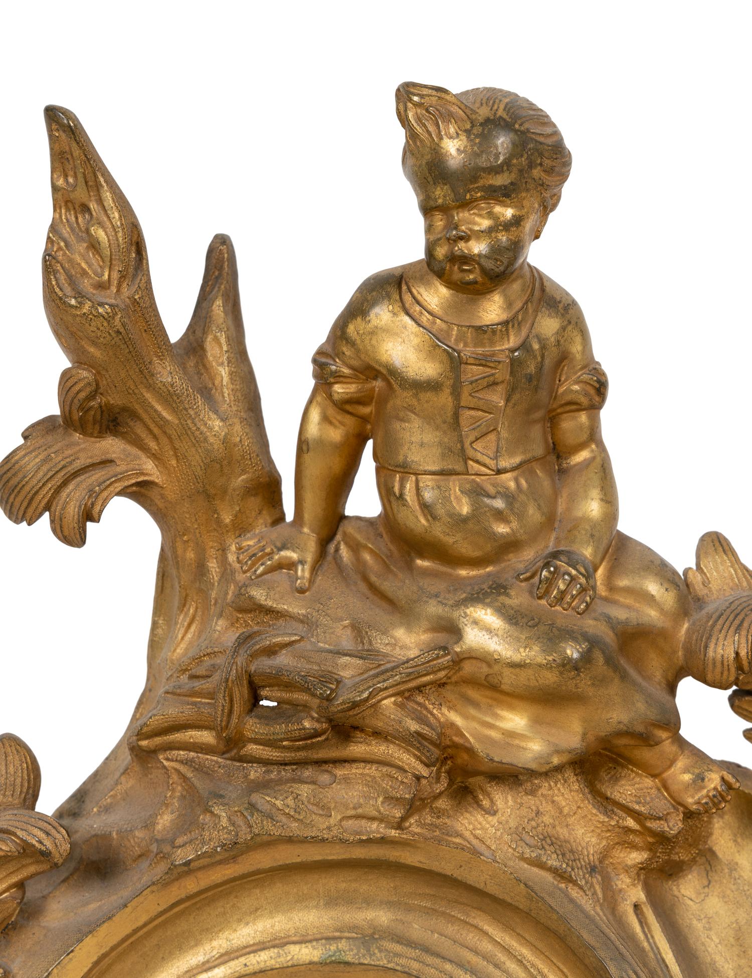 A Pair of Louis XV Style Gilt Bronze Figural Chenets