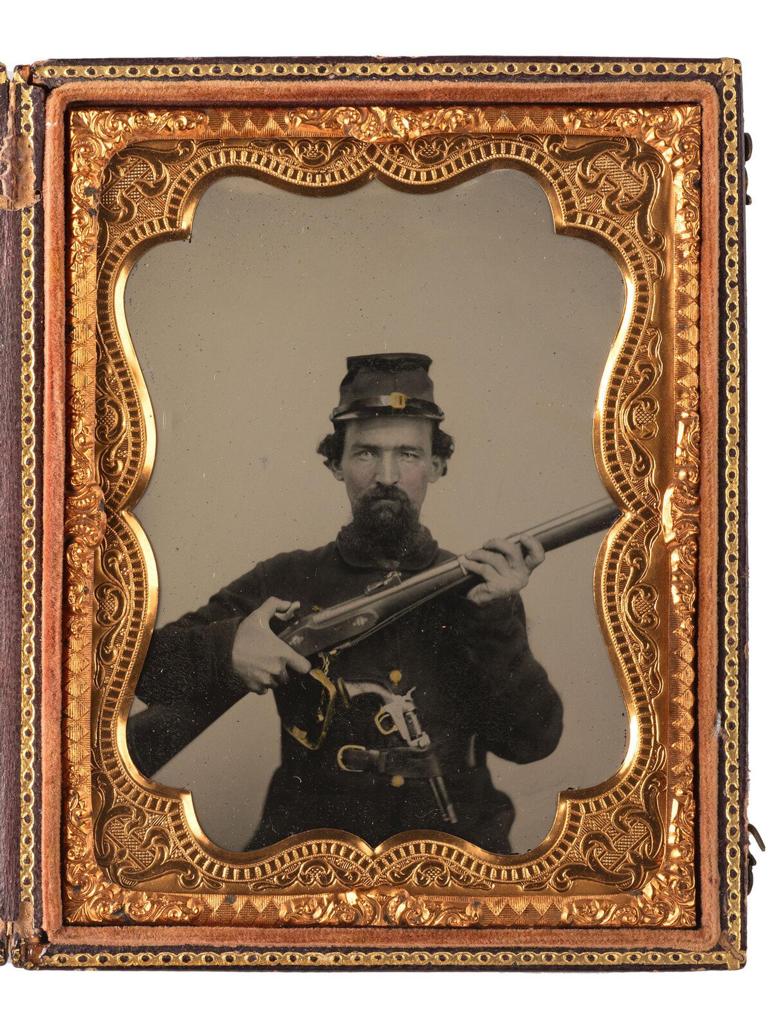 [CIVIL WAR]. COOK, George S. (1819-1902), photographer. Quarter plate ambrotype of a well-armed Confederate soldier. Charleston, SC.