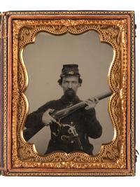 [CIVIL WAR]. COOK, George S. (1819-1902), photographer. Quarter plate ambrotype of a well-armed Confederate soldier. Charleston, SC.