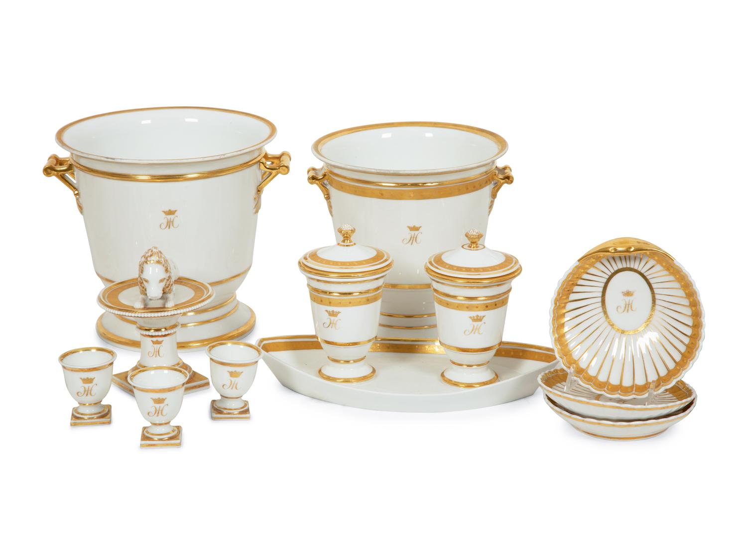 A Continental Gilt Decorated Porcelain Dessert Service