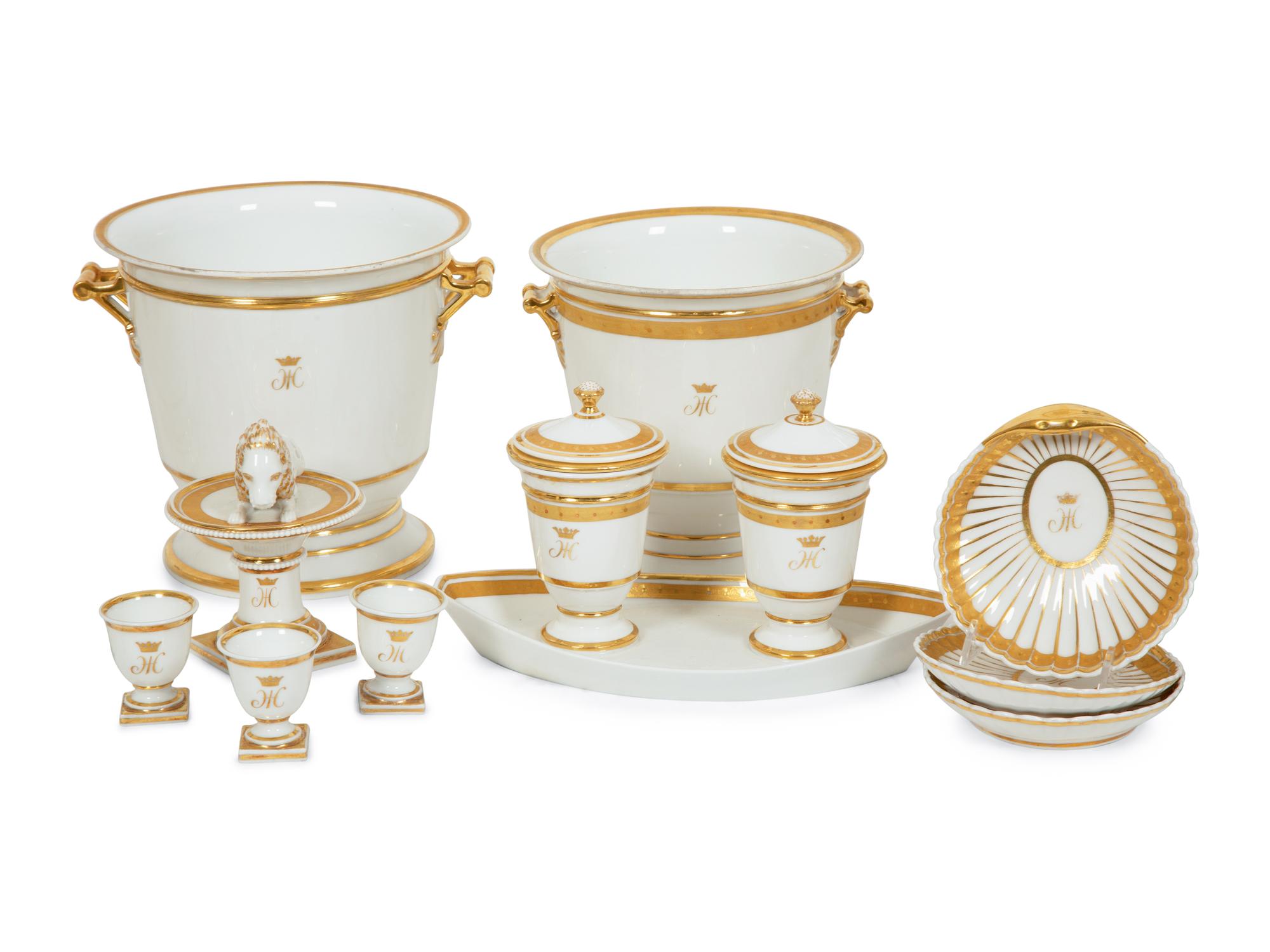 A Continental Gilt Decorated Porcelain Dessert Service