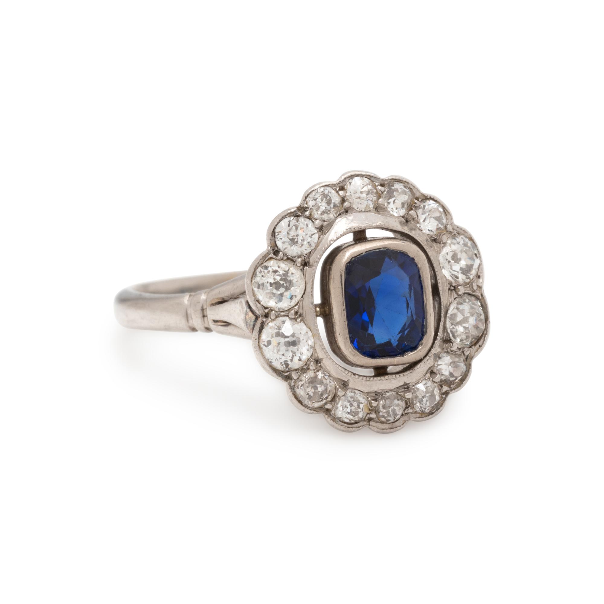PLATINUM, SAPPHIRE AND DIAMOND RING