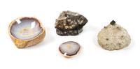 A Set of Four Geodes Width of largest 4 3/4 inches.
