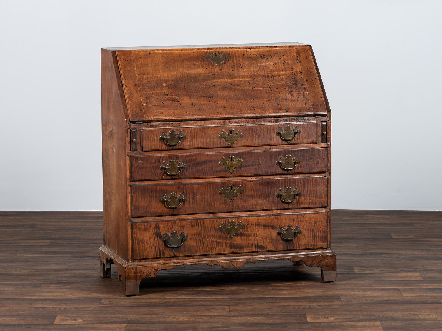 A Chippendale Carved Tiger Maple Slant-Front Desk