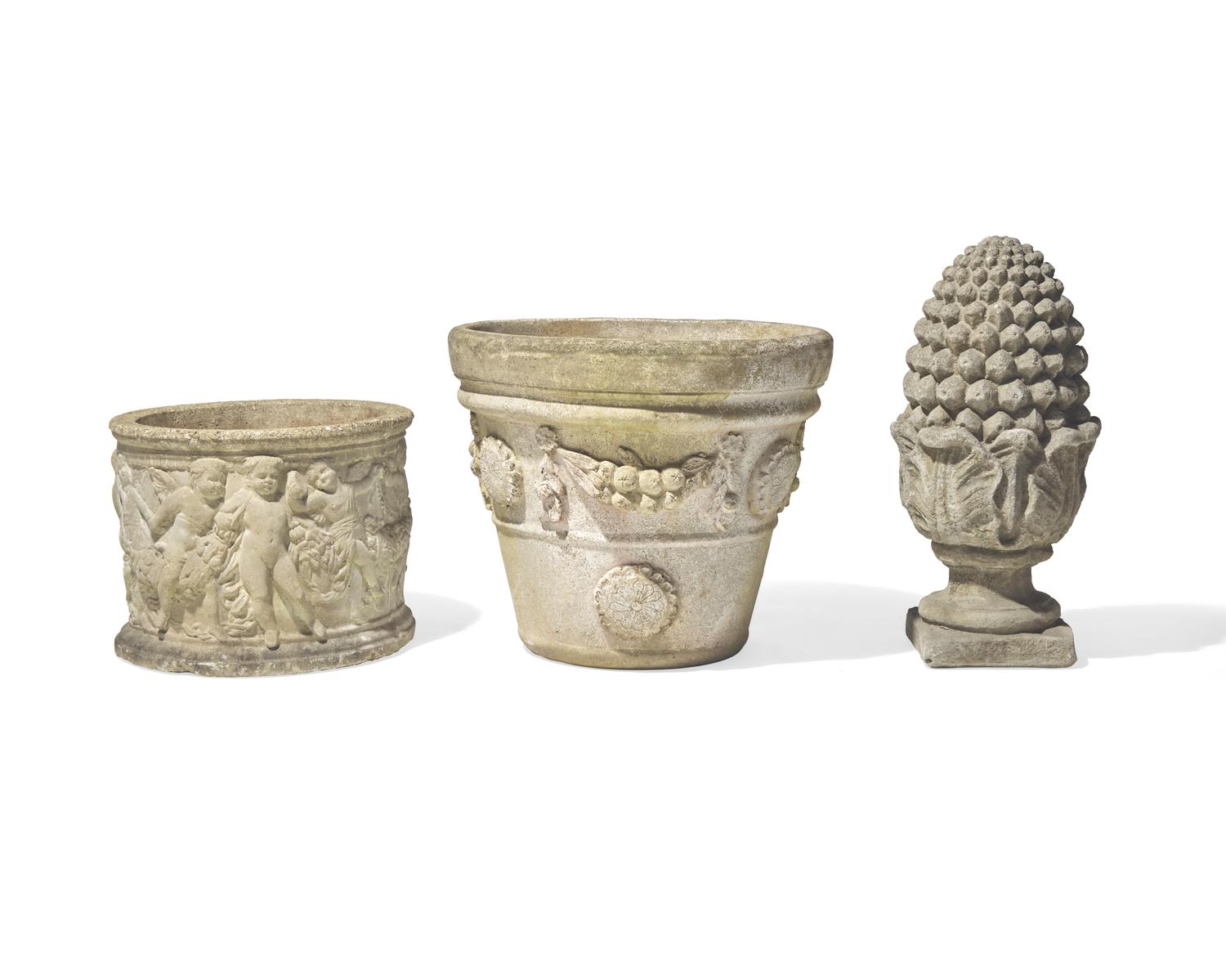 A group of three cast stone and resin garden pots and pineapple finial, 20th century