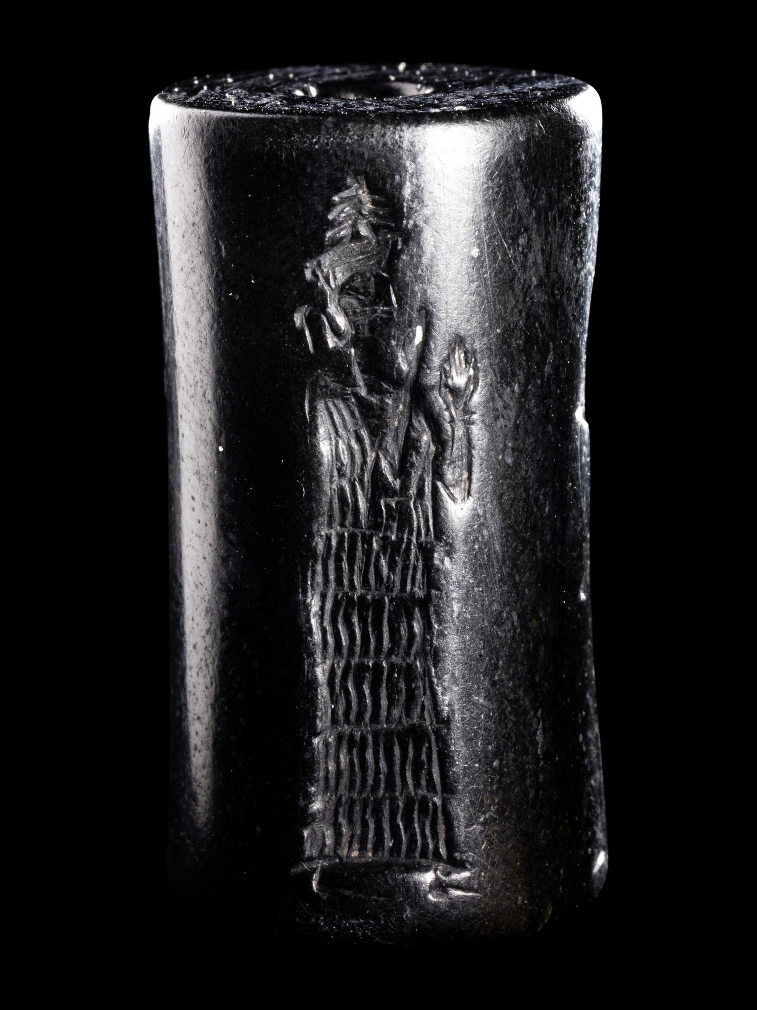 A Mesopotamian Hematite Cylinder Seal