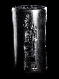 A Mesopotamian Hematite Cylinder Seal