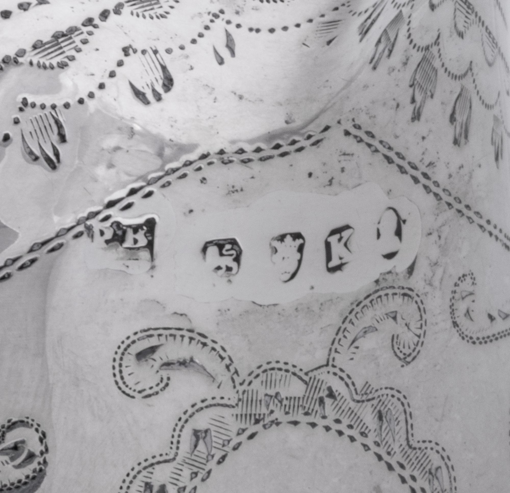 A George III Silver Creamer with Bright-Cut Decoration
