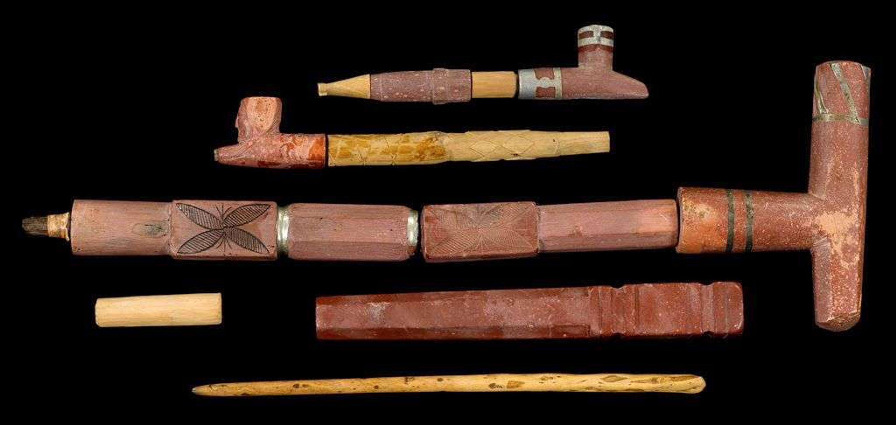 Group of four carved and decorated Sioux Catlinite pipes first half 20th century