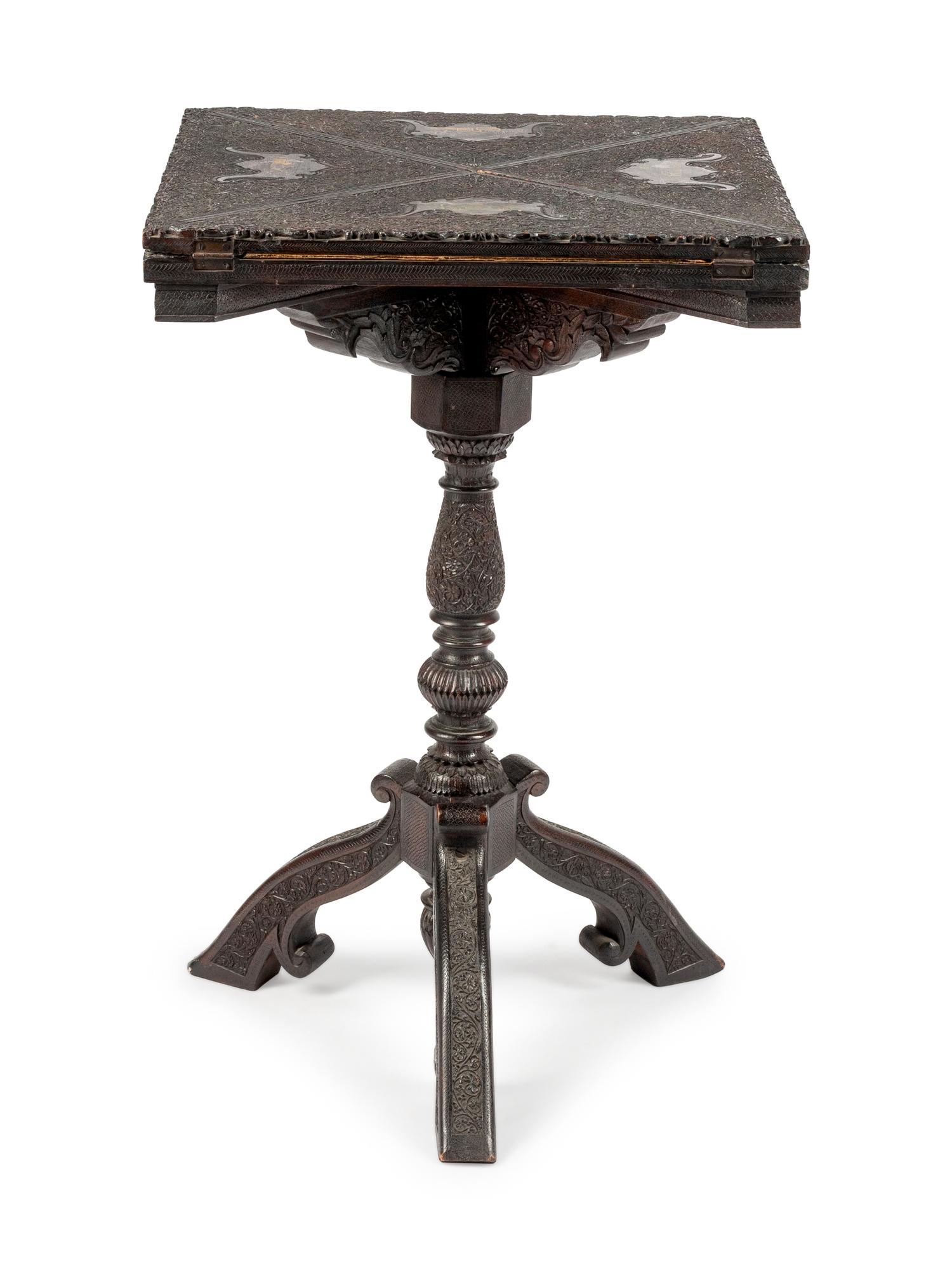 An Anglo-Colonial Carved Handkerchief Table