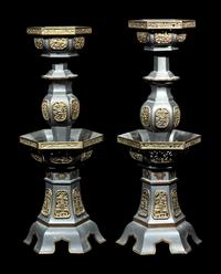 A Pair of Chinese Pewter Candle Holders