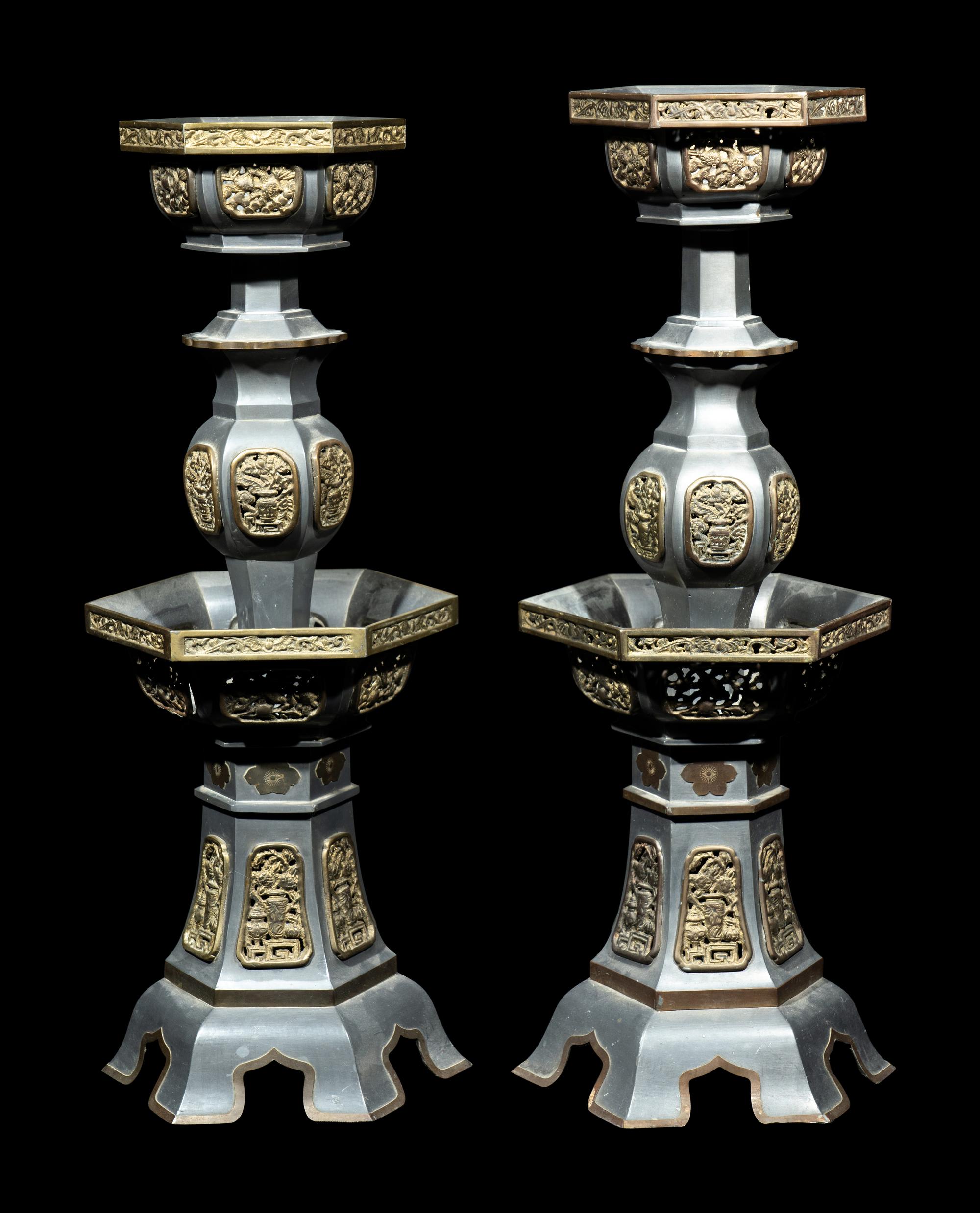 A Pair of Chinese Pewter Candle Holders