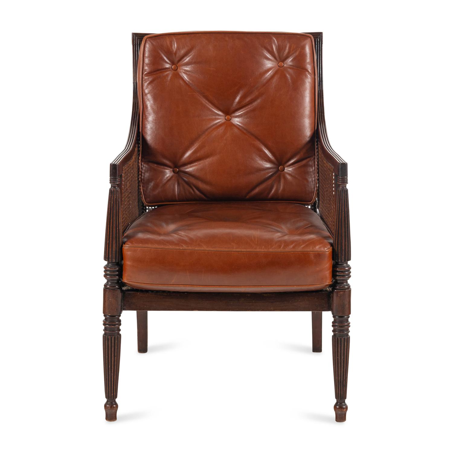 An English Mahogany and Caned Library Bergère