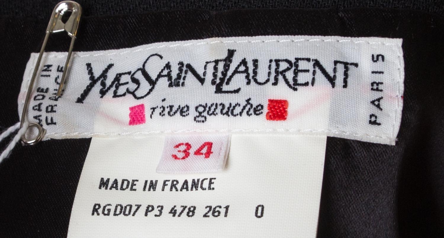 An Yves Saint Laurent Black Wool Coat, Size 34.