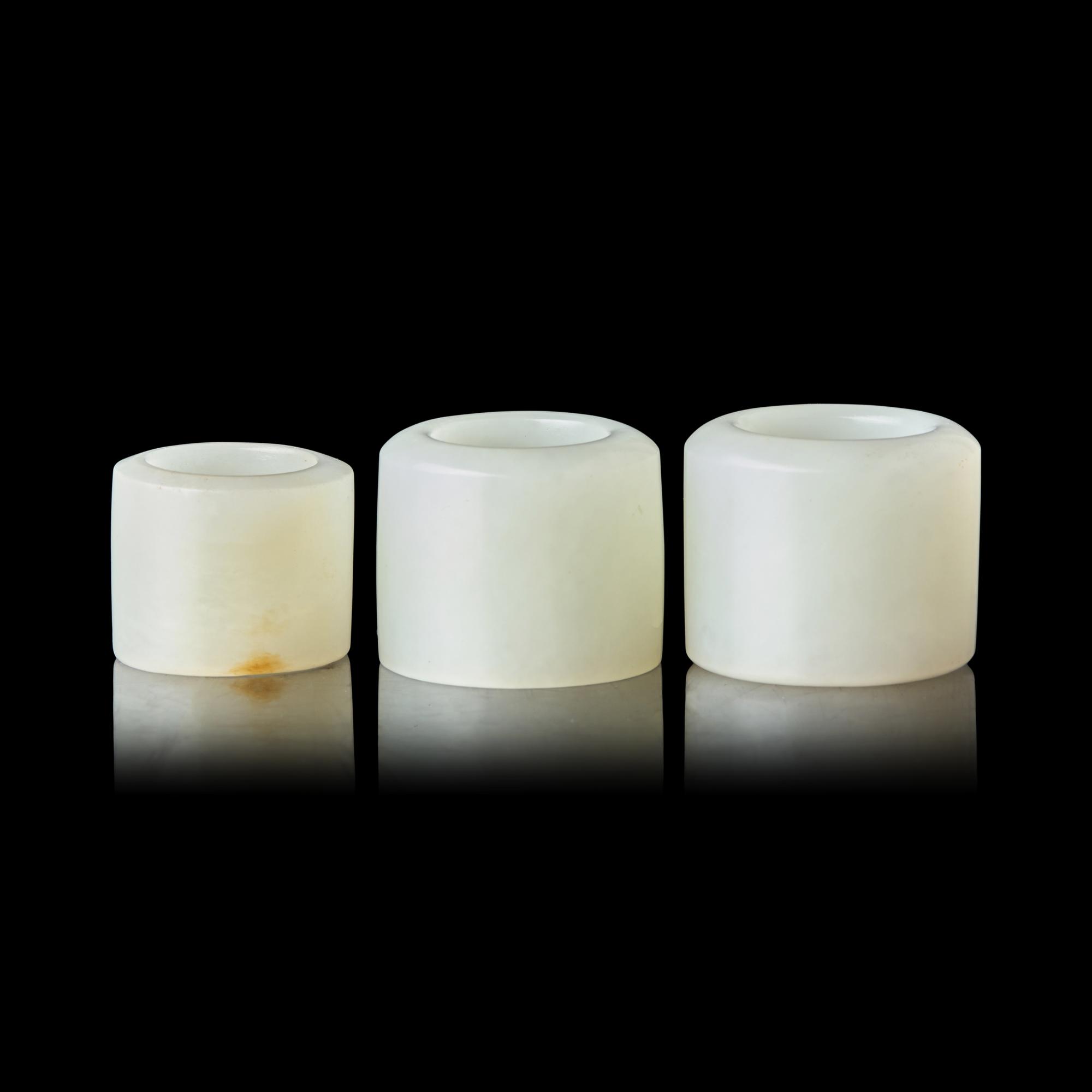 Three Chinese White Jade Archer's Rings, 18th-19th Century 清中期 白玉扳指三枚