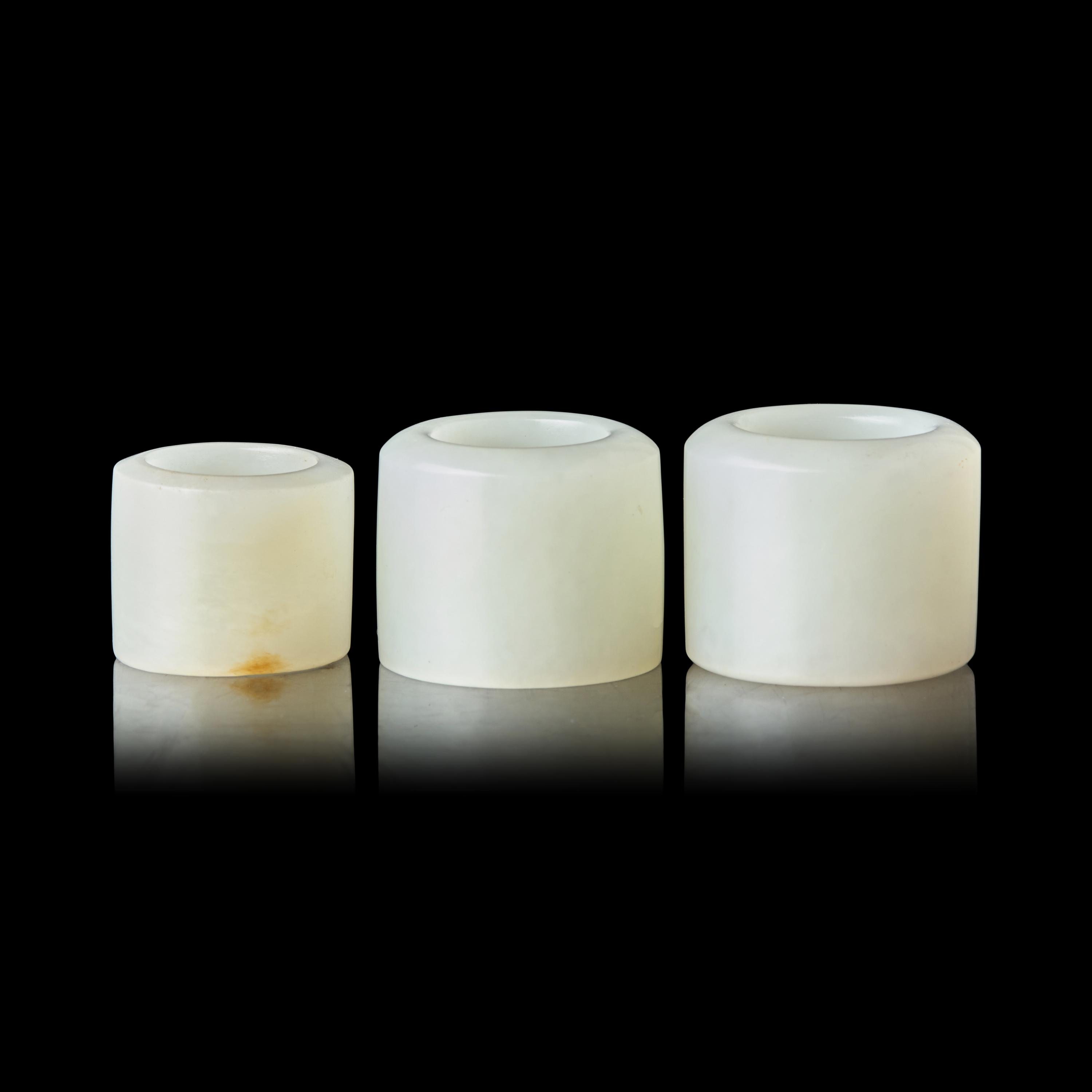 Three Chinese White Jade Archer's Rings, 18th-19th Century 清中期 白玉扳指三枚