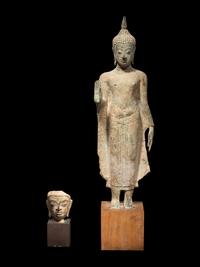 A Thai Bronze Figure of Standing Buddha and a Head of Buddha
