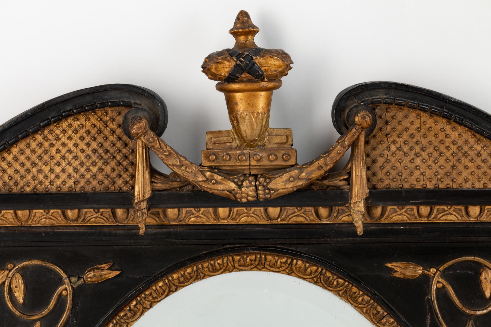 A Pair of English Parcel-Gilt and Ebonized Girandole Mirrors — 19TH CENTURY