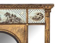 A Classical Giltwood and Eglomise-Inset Mirror