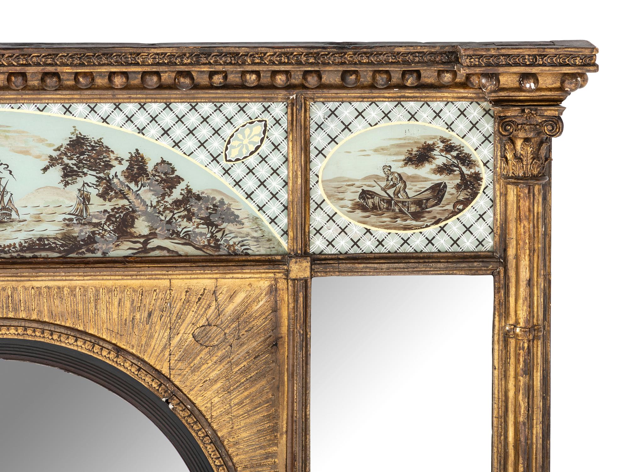 A Classical Giltwood and Eglomise-Inset Mirror