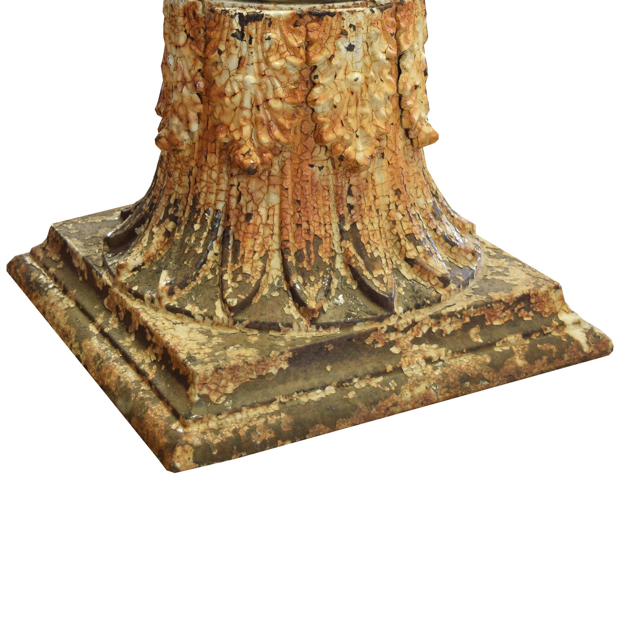 A Pair of Cast Iron Capitals with Candles 13" W x 13" D x 18.75" H — United States, Circa 1880