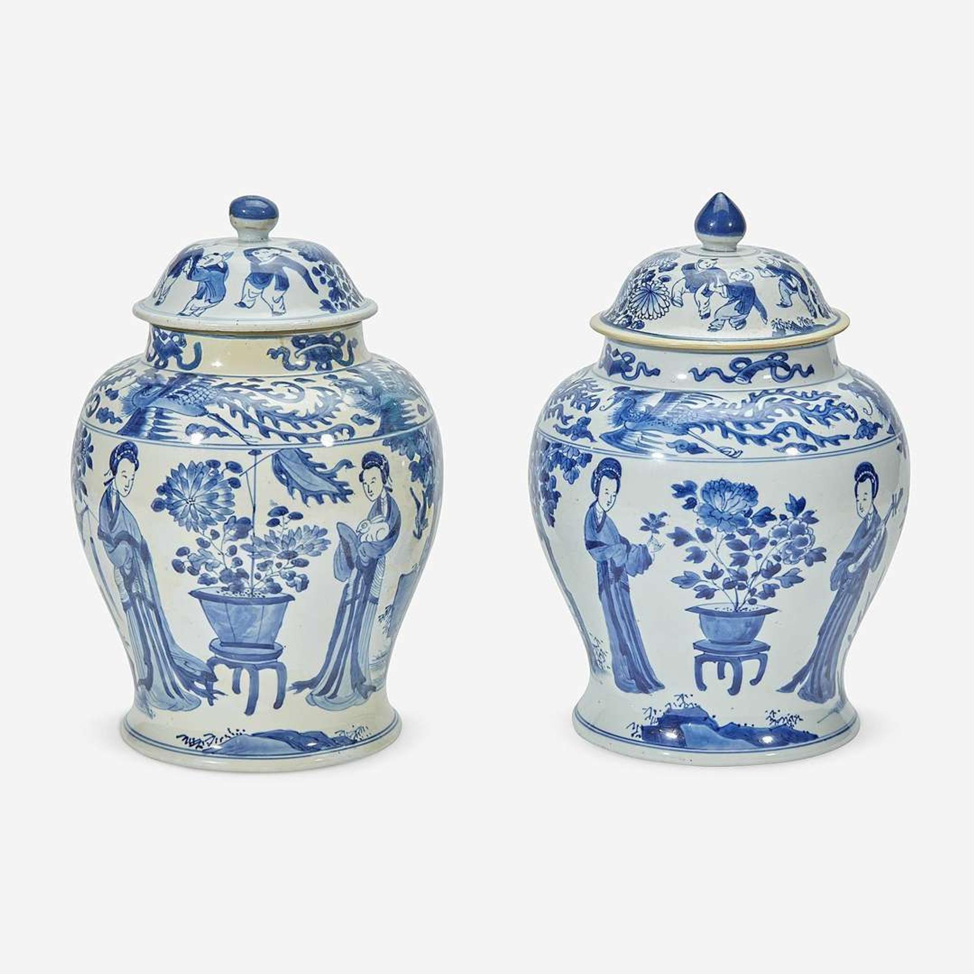 Two similar Chinese blue and white porcelain baluster jars and covers Kangxi period