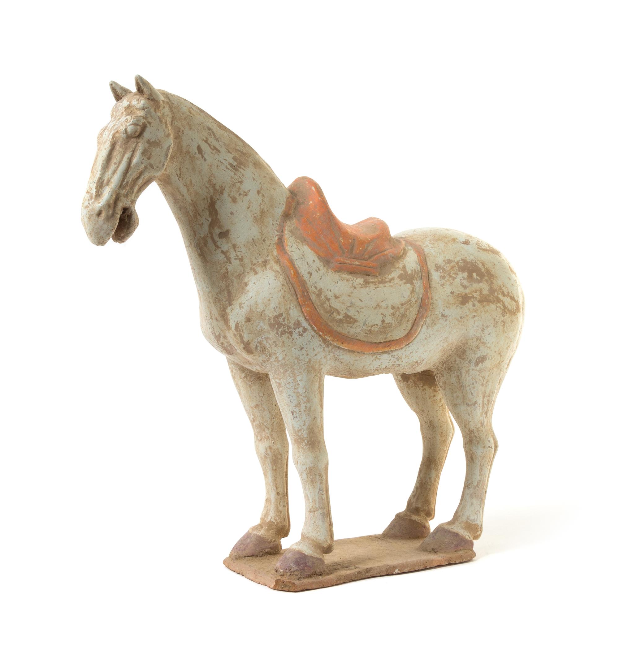 A Painted Pottery Figure of a Horse — TANG DYNASTY
