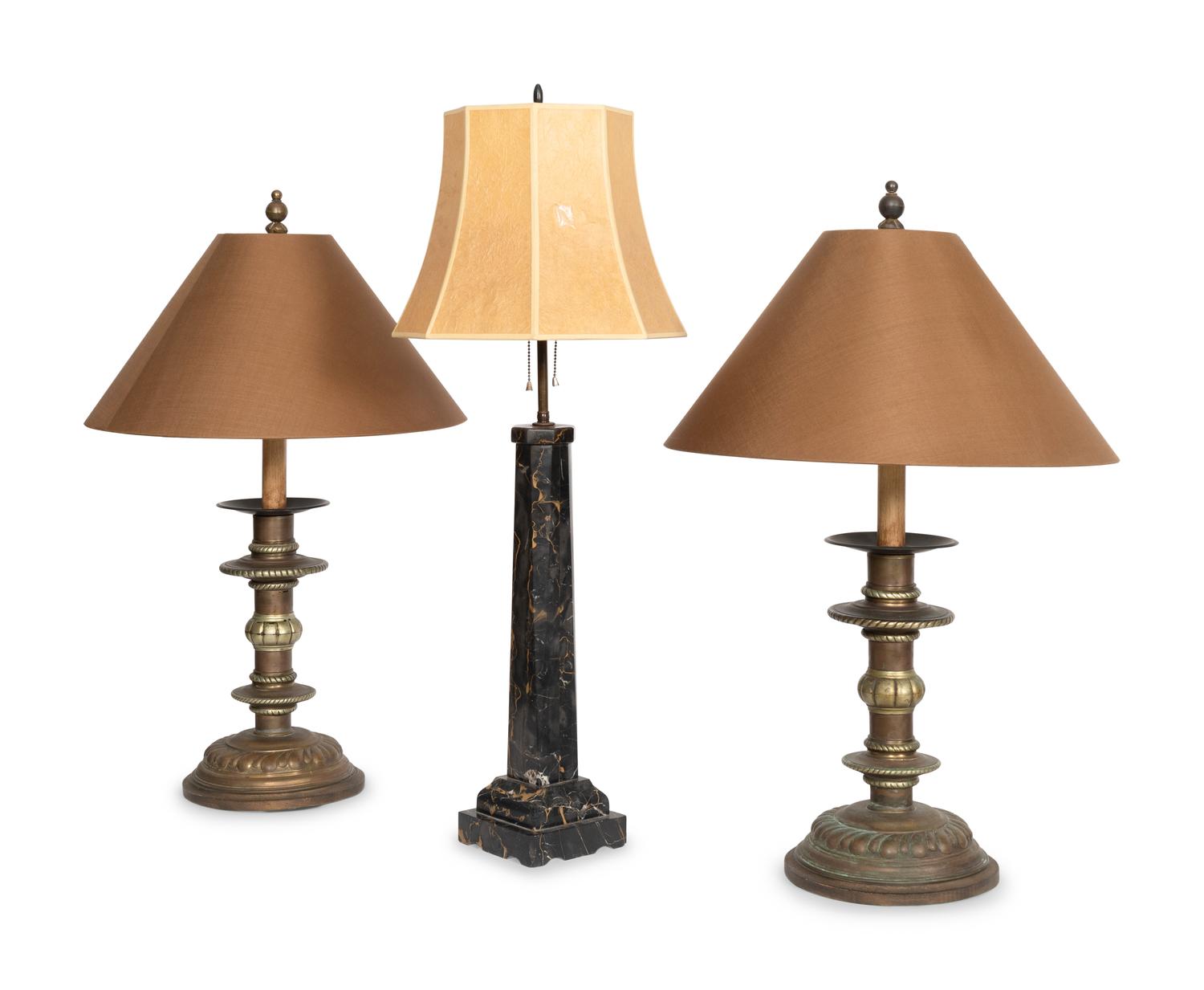 A Pair of Copper Prickets Mounted as Lamps and Associated Black Marble Lamp