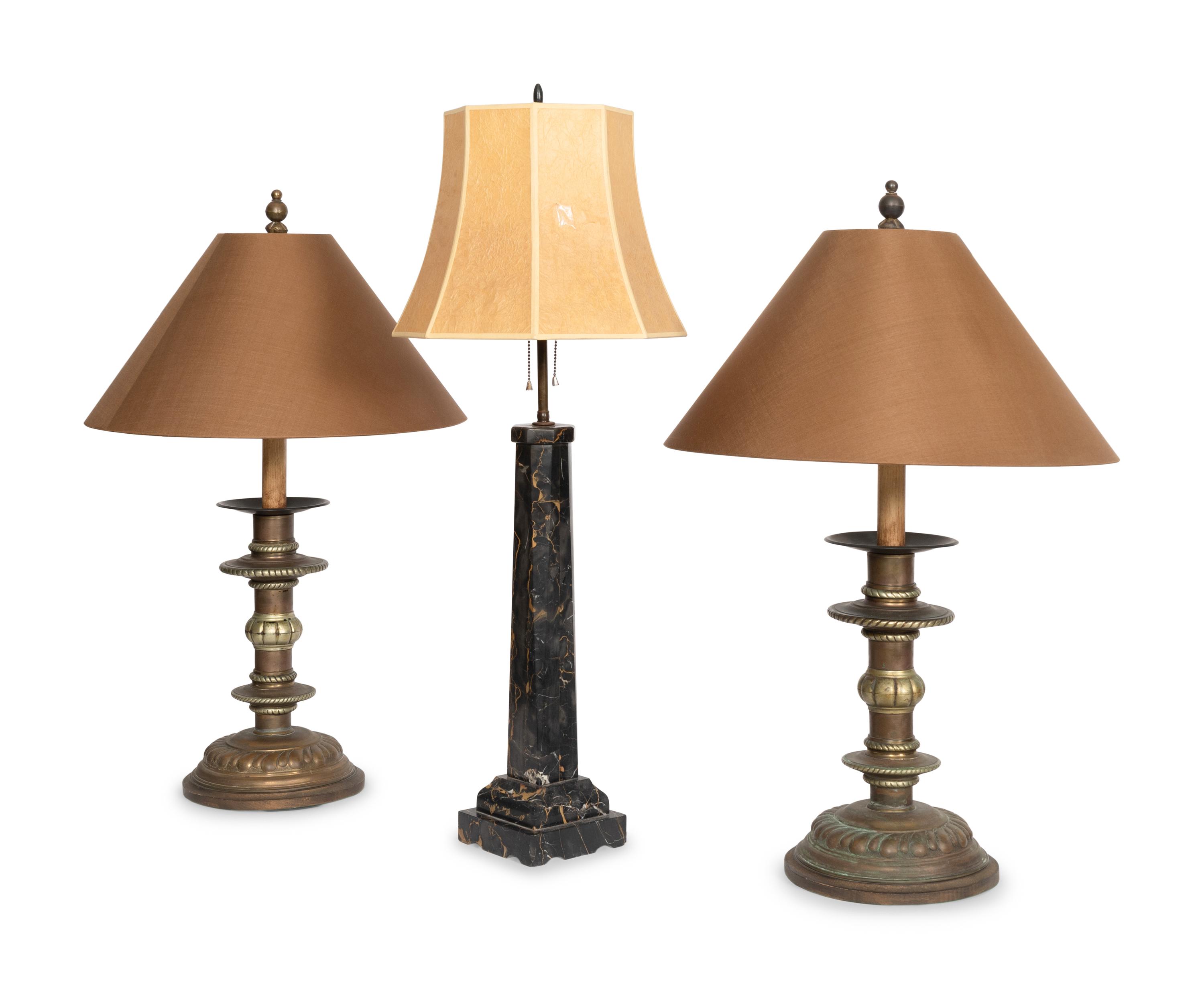 A Pair of Copper Prickets Mounted as Lamps and Associated Black Marble Lamp