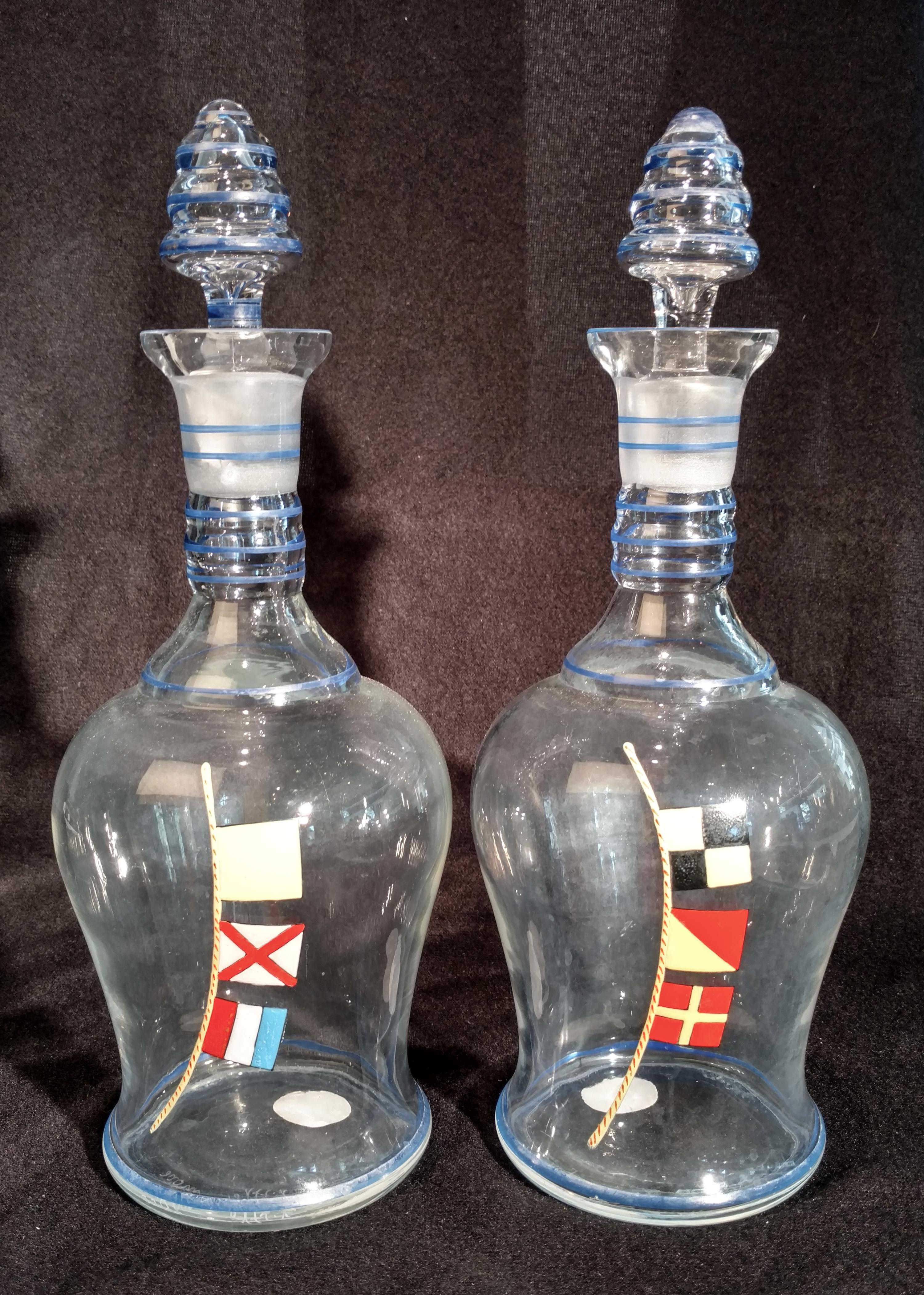 A Pair of Painted Glass Decanters Height 12 inches.