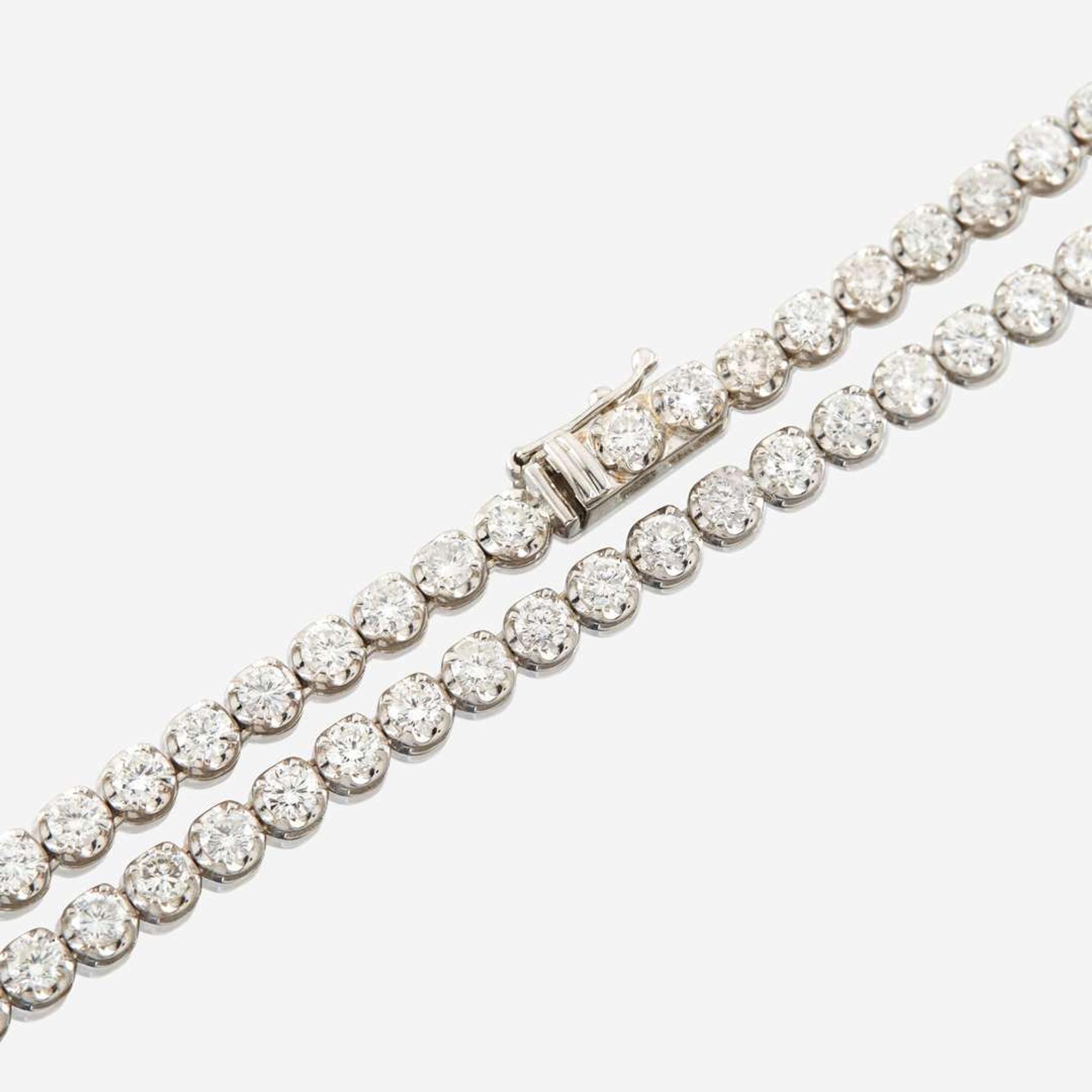 A diamond and white gold necklace