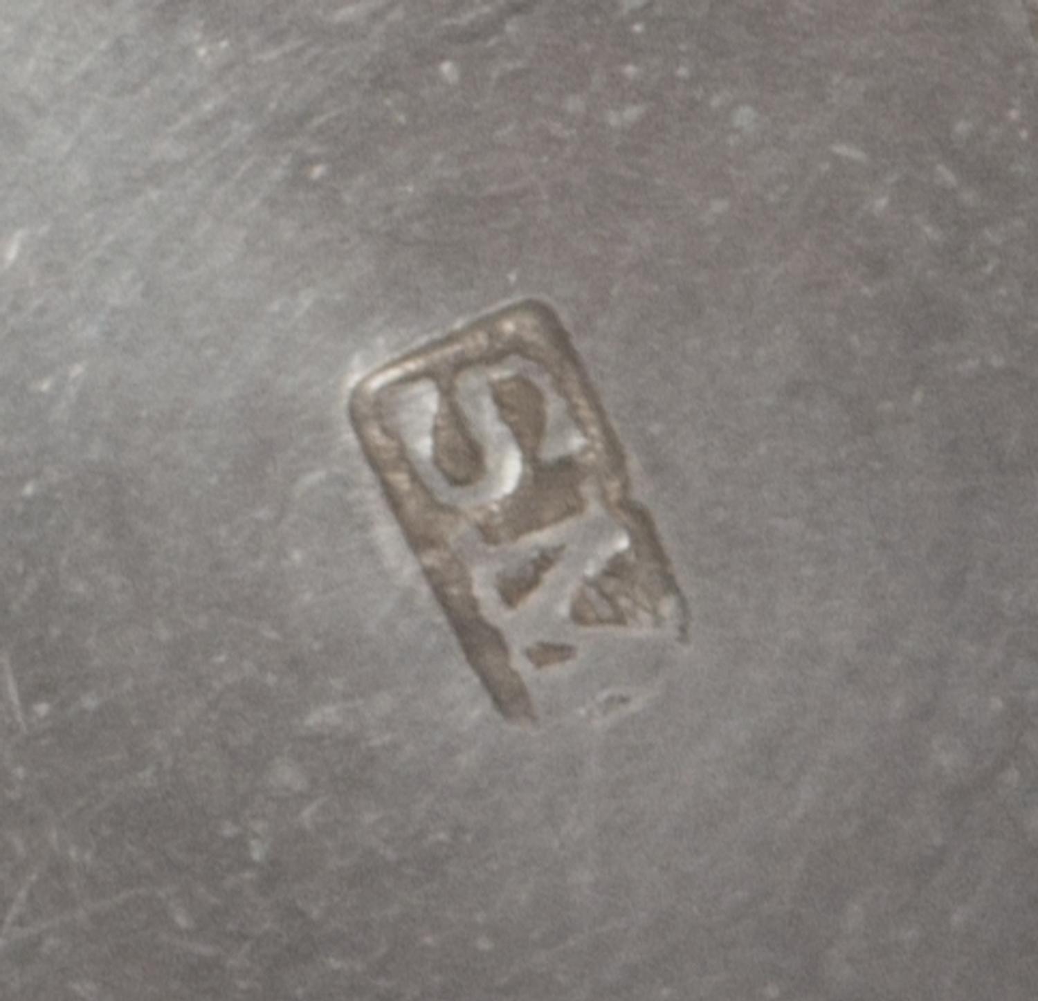 An American Silver Nutmeg Grater, Maker's Mark SM, of ribbed barrel form, one end having the engraved monogram MC.