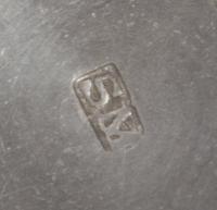 An American Silver Nutmeg Grater, Maker's Mark SM, of ribbed barrel form, one end having the engraved monogram MC.
