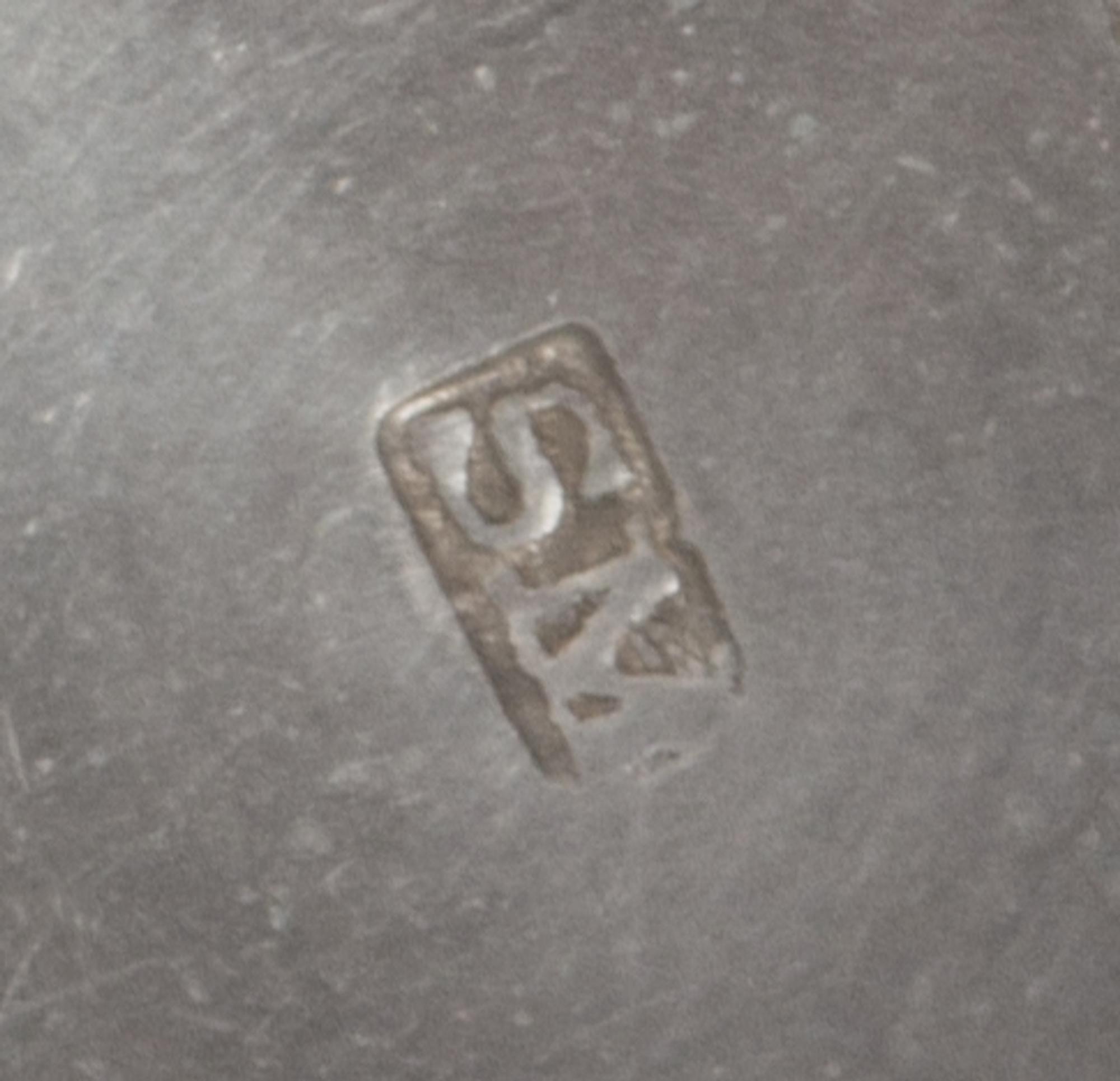 An American Silver Nutmeg Grater, Maker's Mark SM, of ribbed barrel form, one end having the engraved monogram MC.