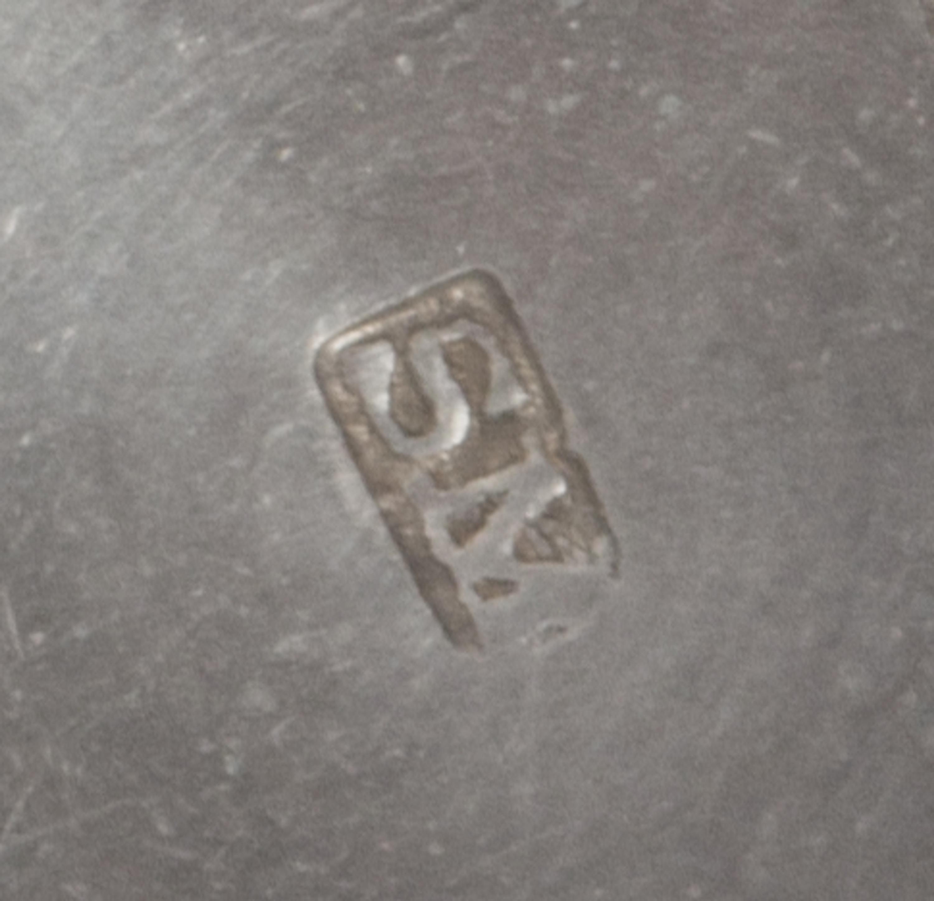 An American Silver Nutmeg Grater, Maker's Mark SM, of ribbed barrel form, one end having the engraved monogram MC.