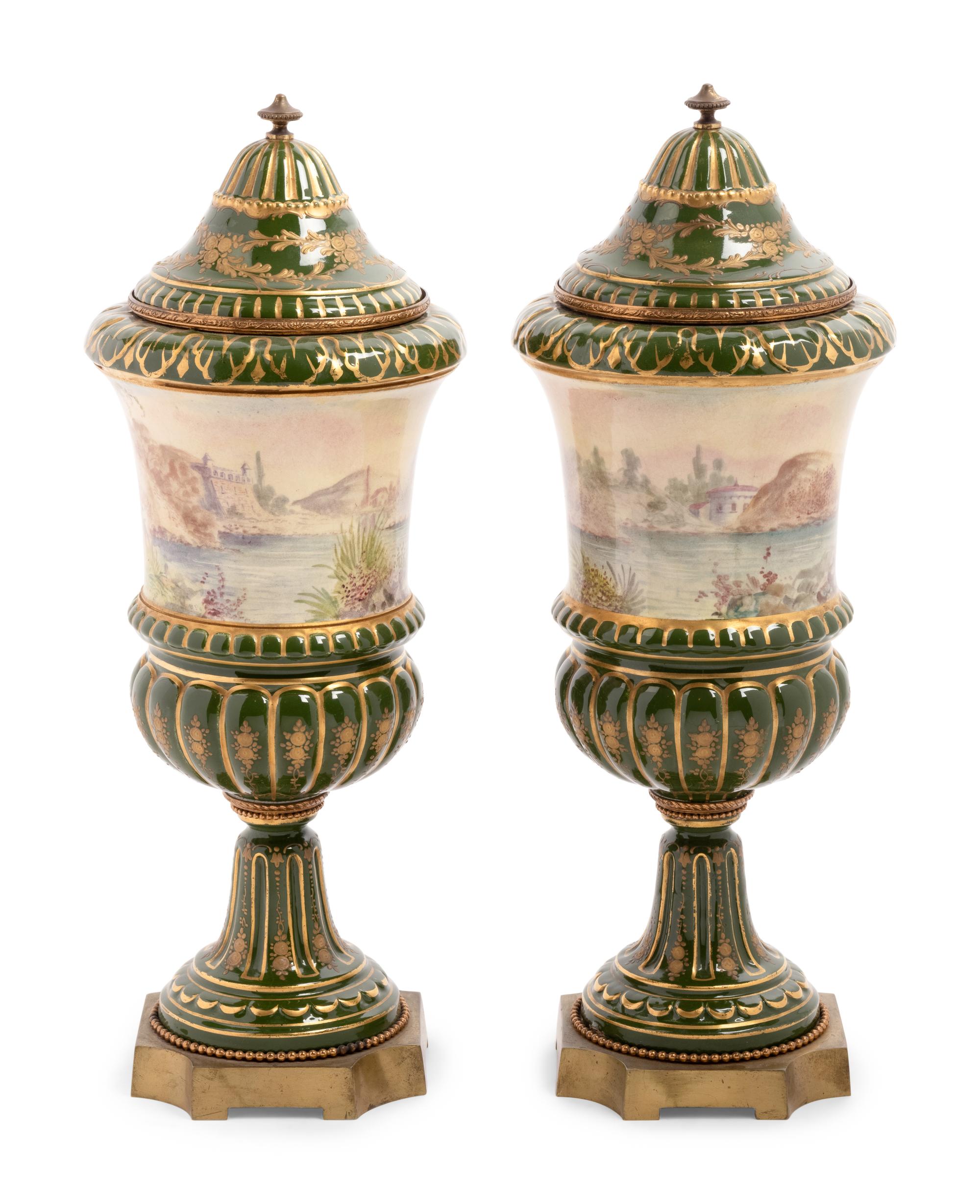 A Pair of Sèvres Style Porcelain Covered Urns