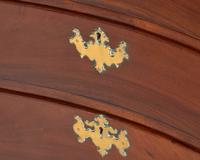 A Chippendale Mahogany Reverse-Serpentine Chest of Drawers