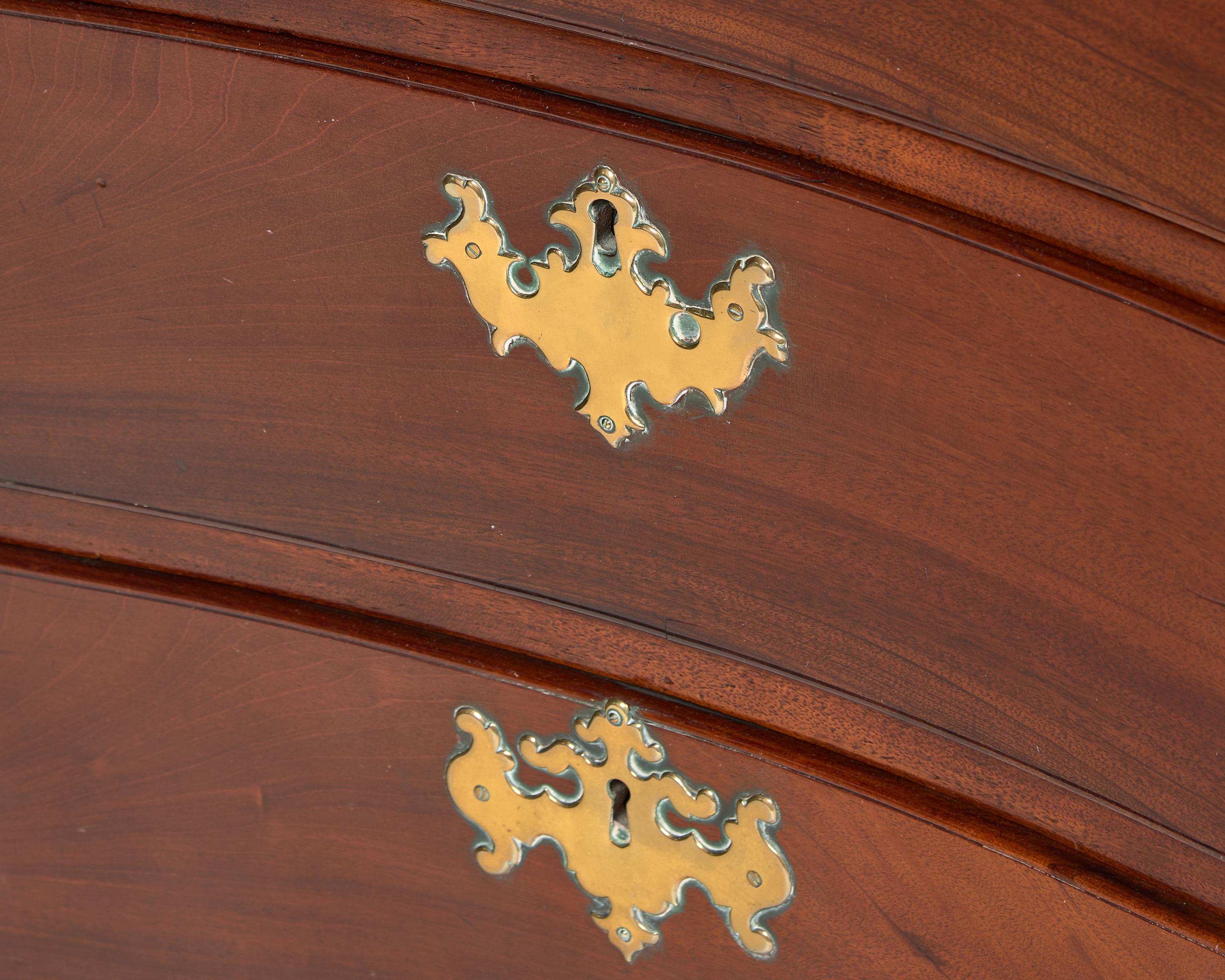 A Chippendale Mahogany Reverse-Serpentine Chest of Drawers