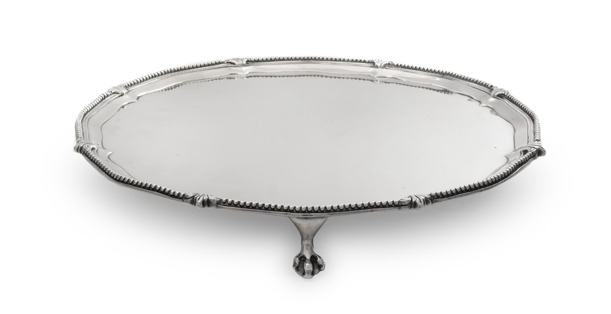 An English Silver Salver, Robert Jones I, London, 1774, raised on paw feet.