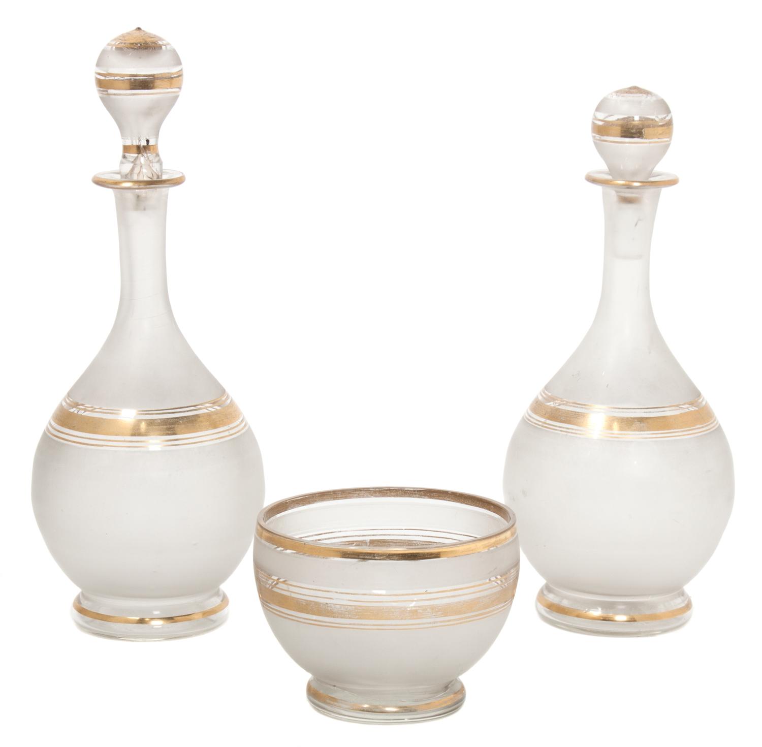 Two Frosted Glass Decanters Height of decanters 8 1/2 inches.
