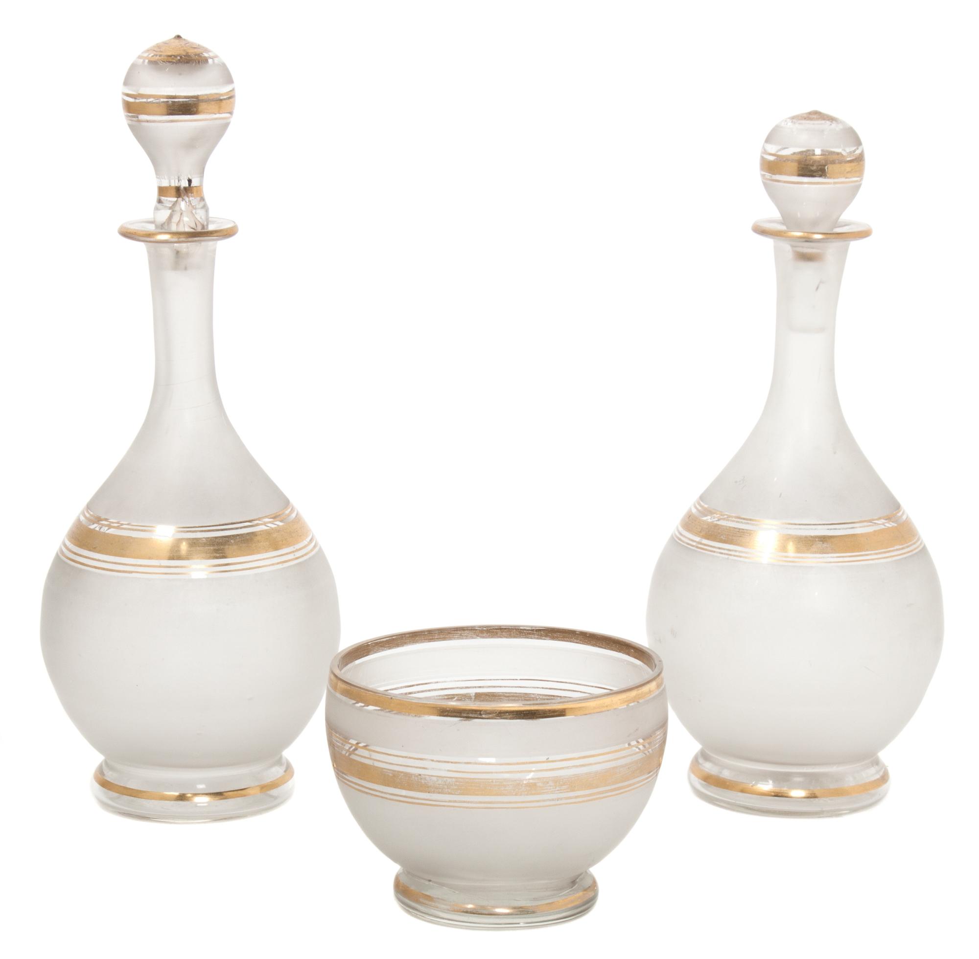 Two Frosted Glass Decanters Height of decanters 8 1/2 inches.