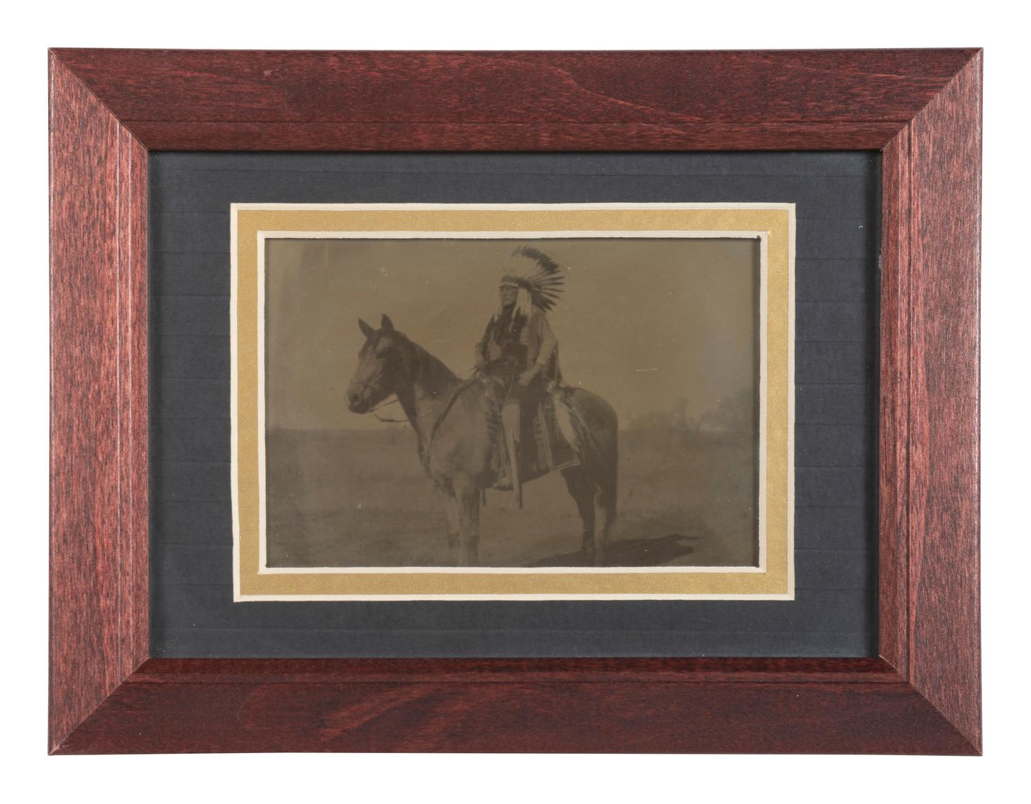 [NATIVE AMERICANS]. 3 tintypes of Native American subjects, incl. a young girl wrapped in a blanket.