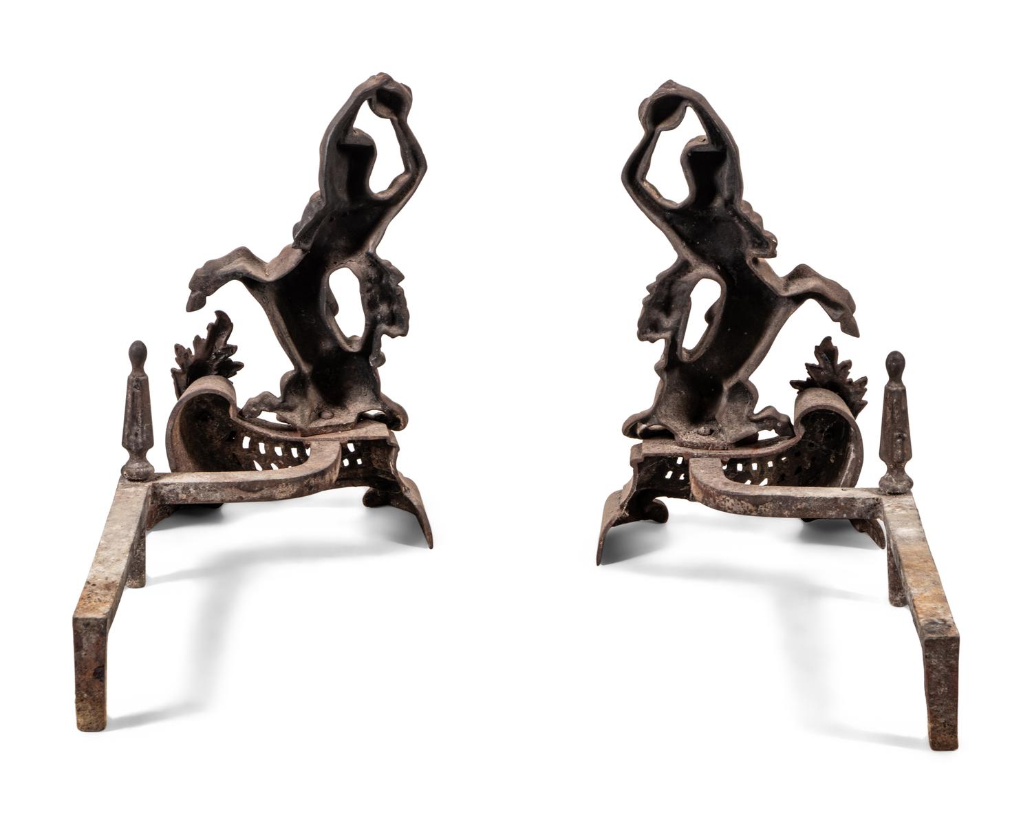 A Pair of Continental Iron Andirons with Hercules and the Nemean Lion