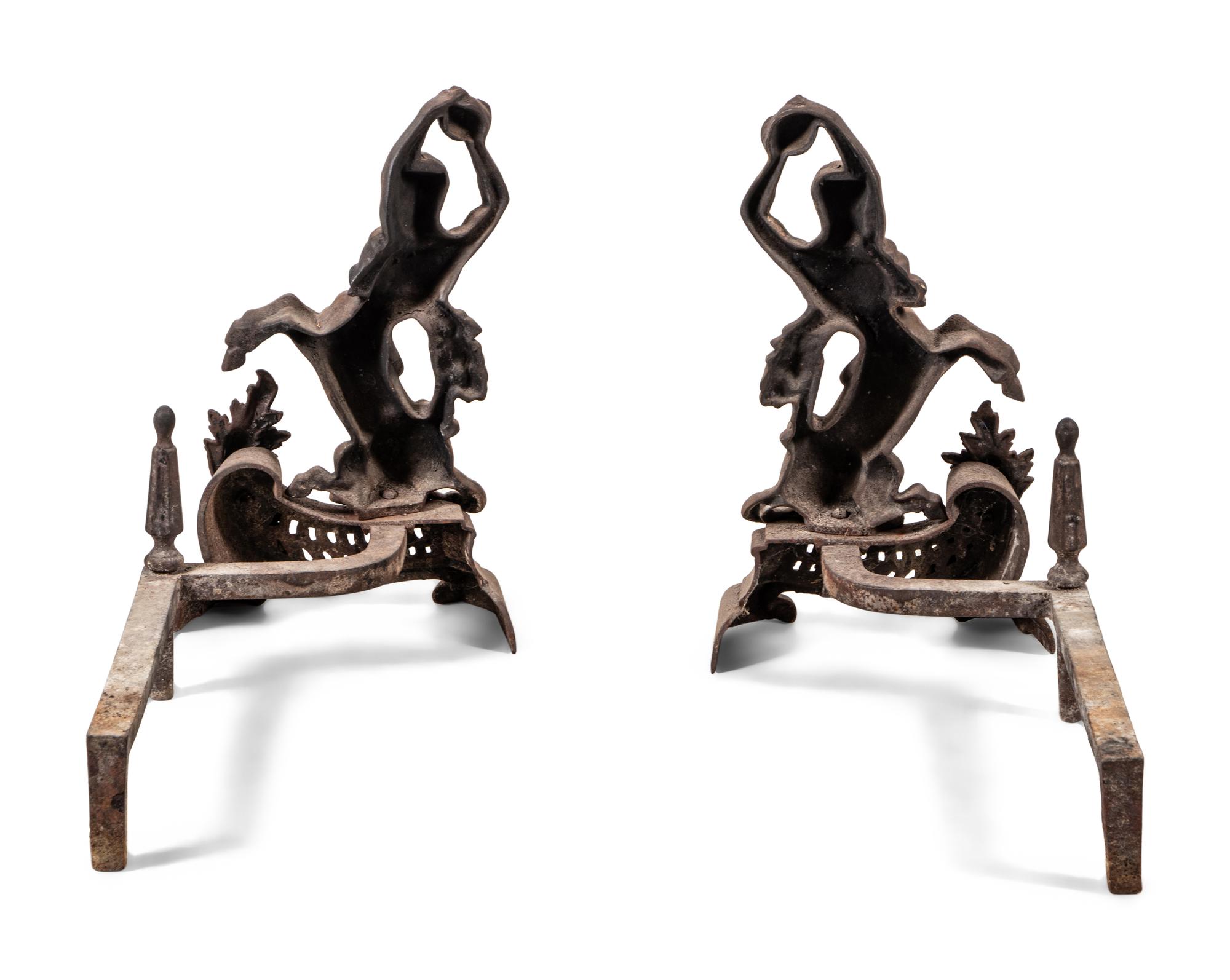 A Pair of Continental Iron Andirons with Hercules and the Nemean Lion