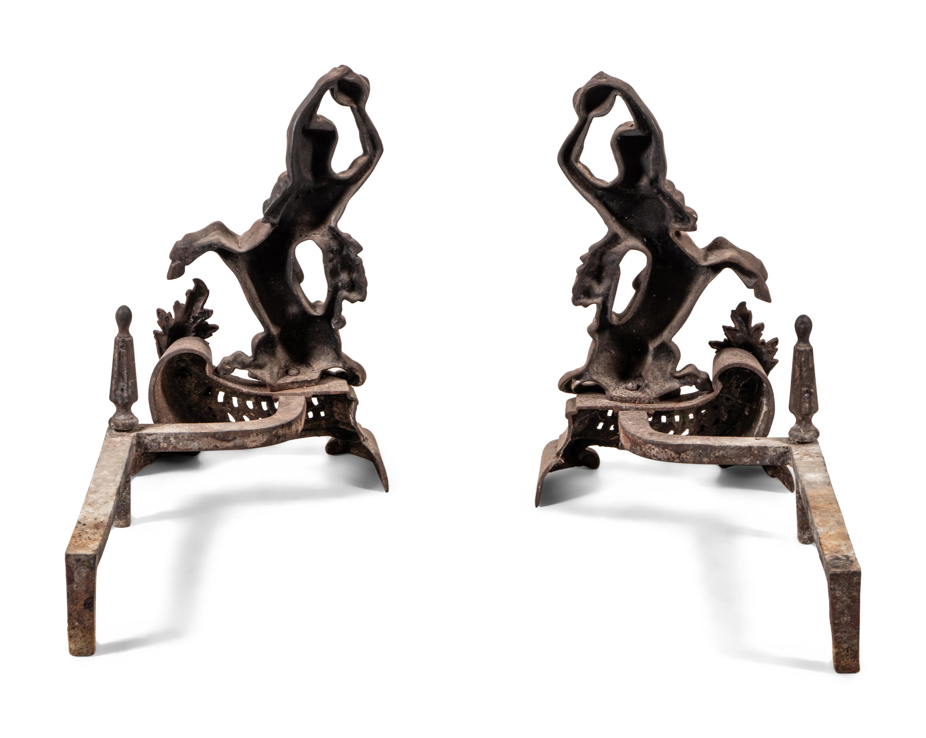A Pair of Continental Iron Andirons with Hercules and the Nemean Lion